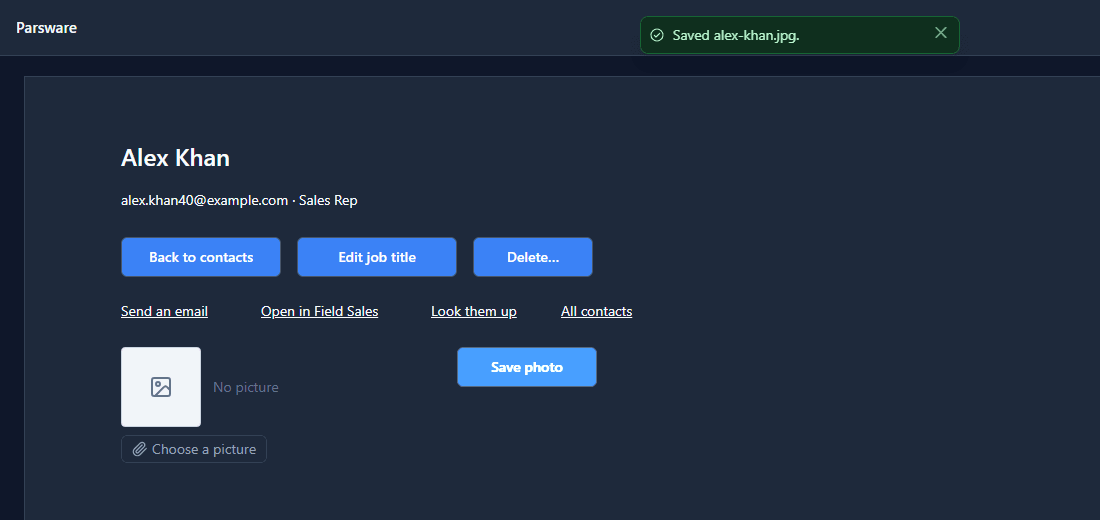 The same screen with the picker empty again and a message at the top: Saved alex-khan.jpg.