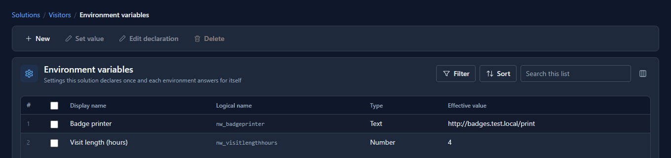 The Environment variables list in Test: Badge printer set to http://badges.test.local/print, Visit length (hours) 4