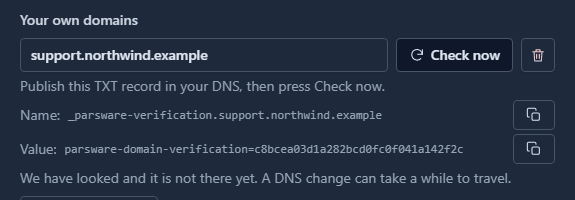 support.northwind.example with Check now and Remove. Publish this TXT record in your DNS, then press Check now. Name: _parsware-verification.support.northwind.example, Value: parsware-domain-verification= followed by a 32-character code, each with a Copy button. Below: We have looked and it is not there yet. A DNS change can take a while to travel.
