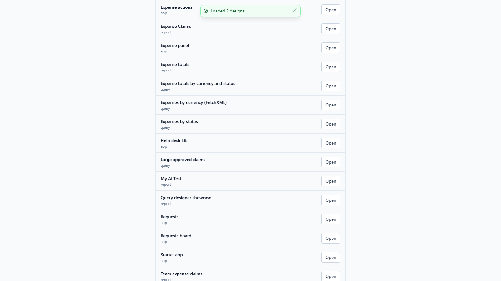The design list after loading, with the message Loaded 2 designs. Help desk kit and Requests board are in the list with the other designs